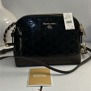 Michael Kors “Jet Set Lg Dome Bag” crossbody
